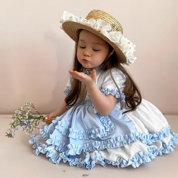 Jesusito de niña blanco y celeste LEONOR en popelín