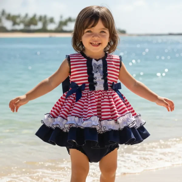 Vestido de nña estilo marinero, rallas rojas horzontales y detalles de tejido en azul marino