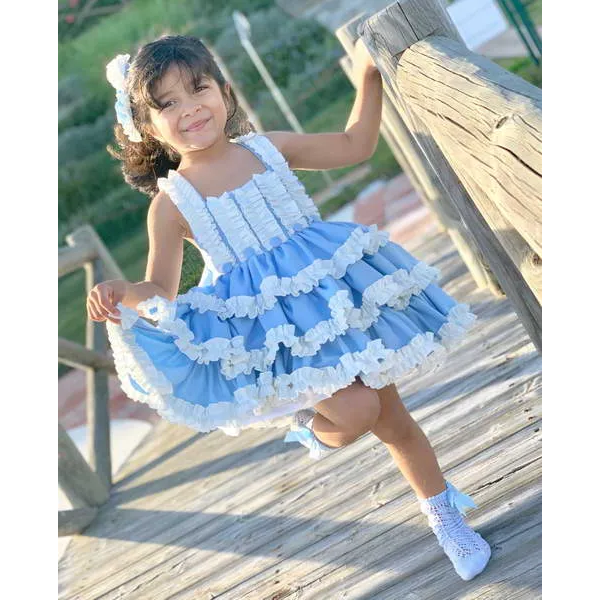 celeste-vestido-niña-rizos-paris-reino unido