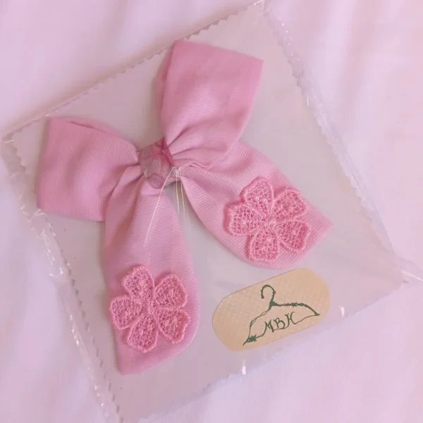 lazo niña rosa con flor bordada y acabado suave